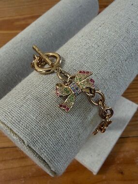 Coach Gold-Tone Bow Charm Bracelet with Multicolor Stones